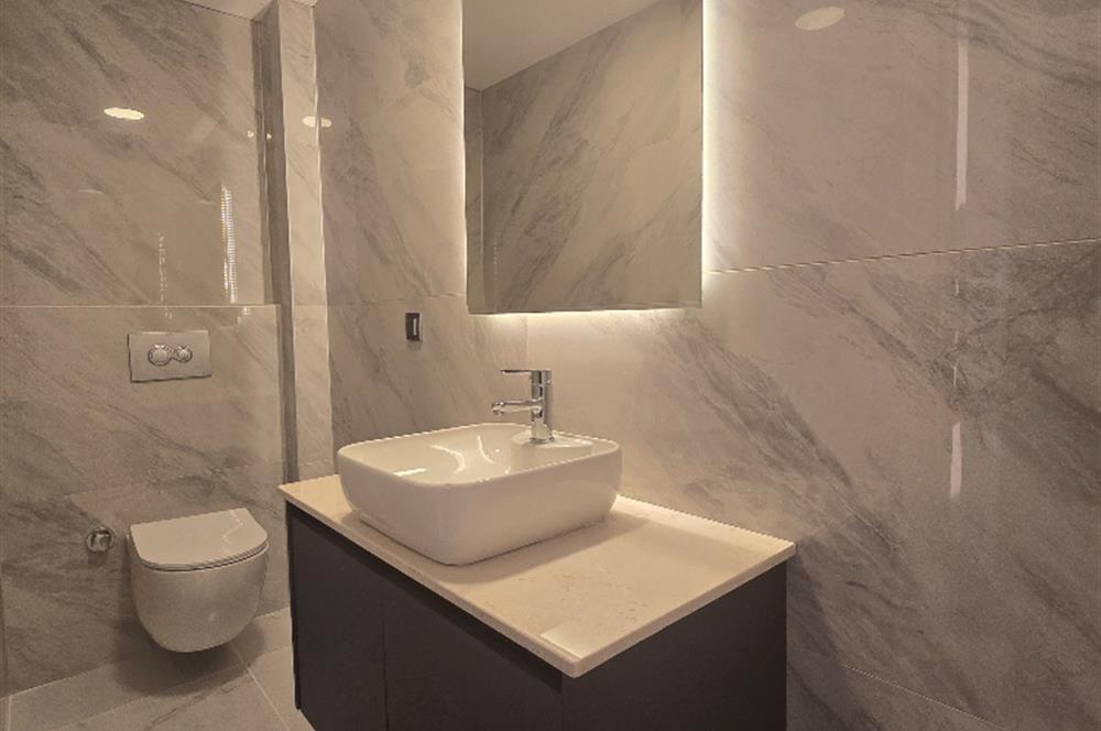 BODRUM GÜMÜŞLÜK PLAJLI İSKELELİ SOSYAL TESİSLİ SATILIK DAİRE