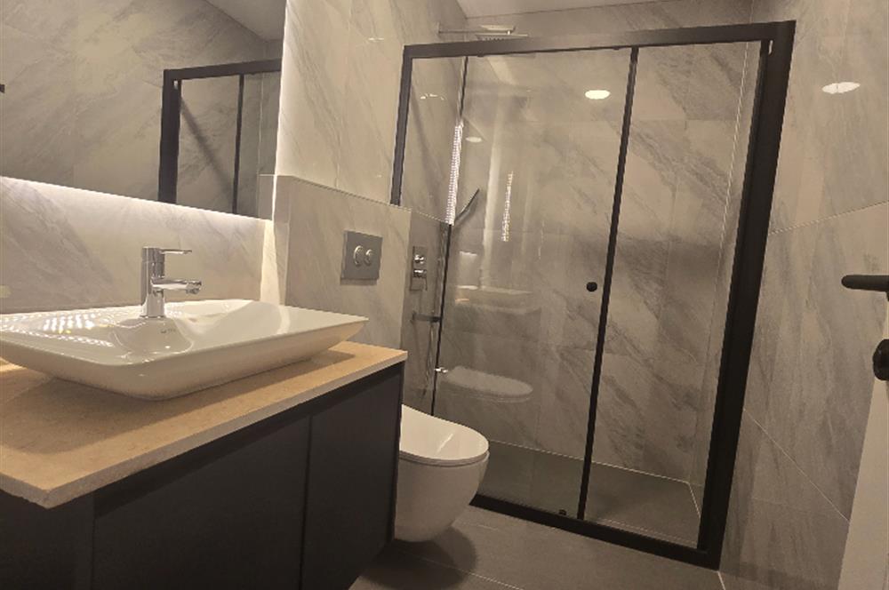 BODRUM GÜMÜŞLÜK PLAJLI İSKELELİ SOSYAL TESİSLİ SATILIK DAİRE