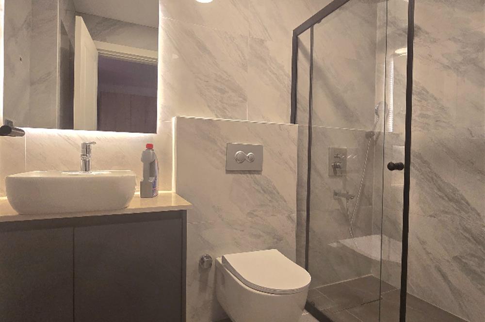 BODRUM GÜMÜŞLÜK PLAJLI İSKELELİ SOSYAL TESİSLİ SATILIK DAİRE