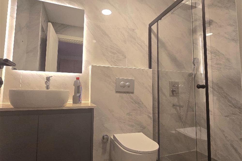 BODRUM GÜMÜŞLÜK PLAJLI İSKELELİ SOSYAL TESİSLİ SATILIK DAİRE