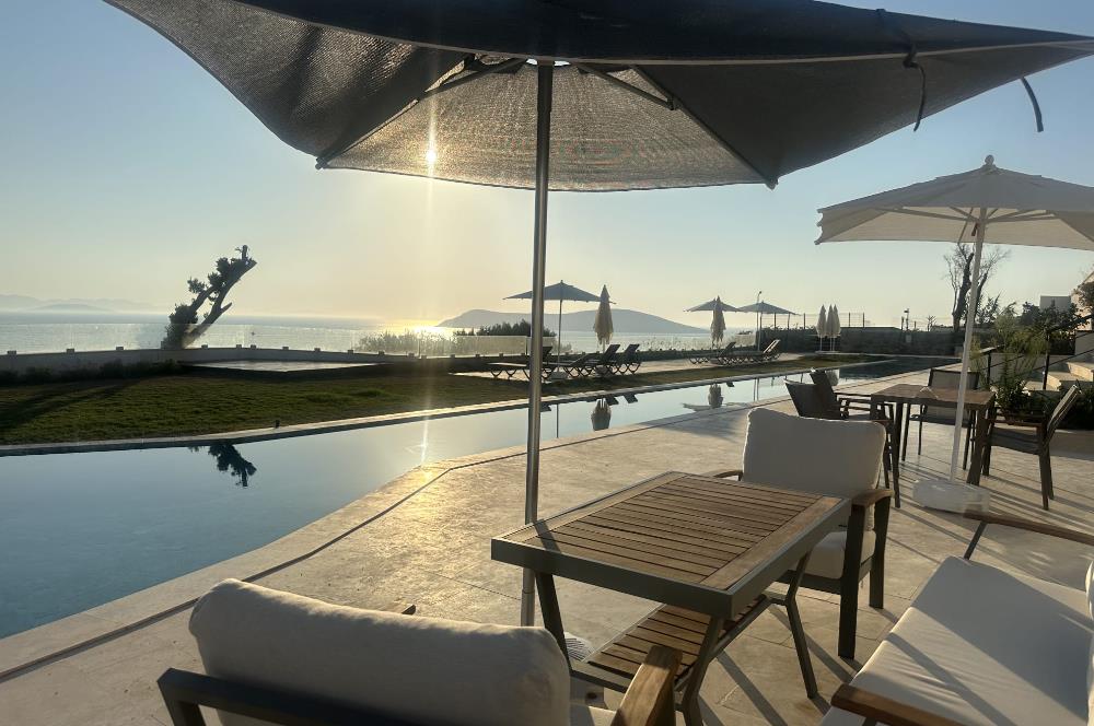 BODRUM GÜMÜŞLÜK PLAJLI İSKELELİ SOSYAL TESİSLİ SATILIK DAİRE