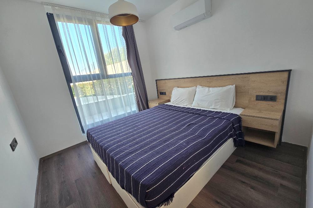 BODRUM GÜMÜŞLÜK DENİZE SIFIR SİTEDE 2+1 SATILIK DAİRE