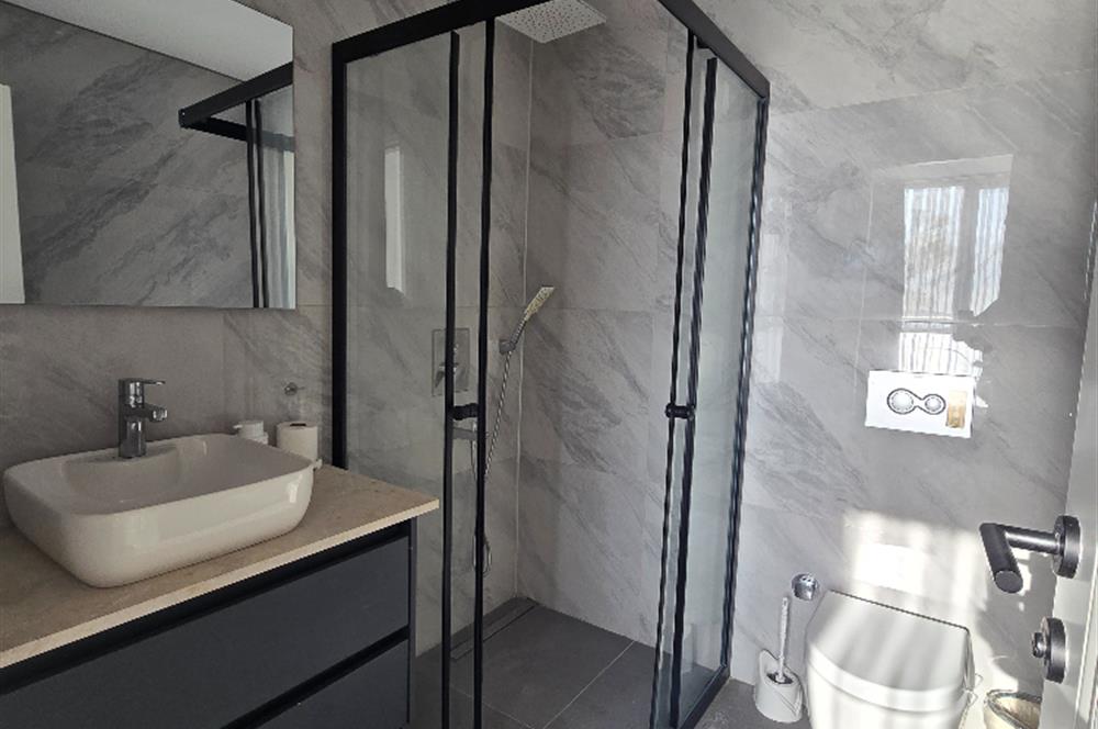 BODRUM GÜMÜŞLÜK DENİZE SIFIR SİTEDE 2+1 SATILIK DAİRE