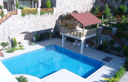 Bodrum Bağla’da Satılık Deniz manzaralı 3+2 Bahçe Katı Daire