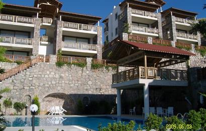 Bodrum Bağla’da Satılık Deniz manzaralı 3+2 Bahçe Katı Daire