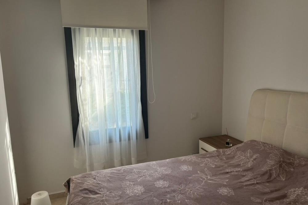 Bodrum Bağla’da Satılık Deniz manzaralı 3+2 Bahçe Katı Daire