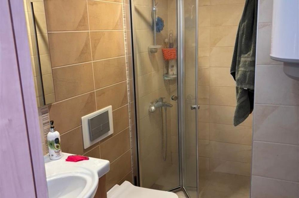 Bodrum Bağla’da Satılık Deniz manzaralı 3+2 Bahçe Katı Daire