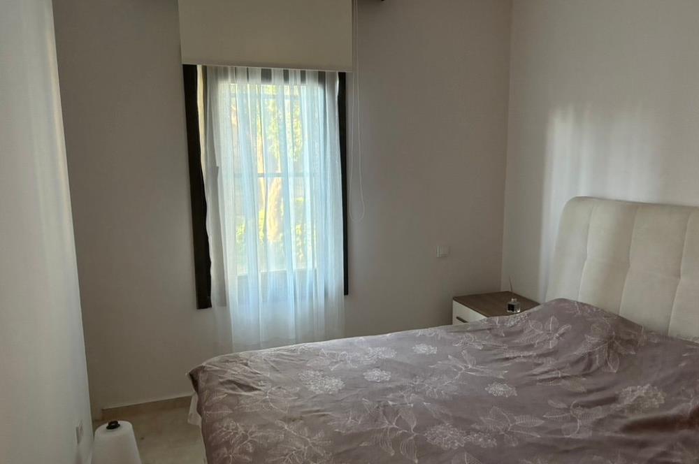 Bodrum Bağla’da Satılık Deniz manzaralı 3+2 Bahçe Katı Daire