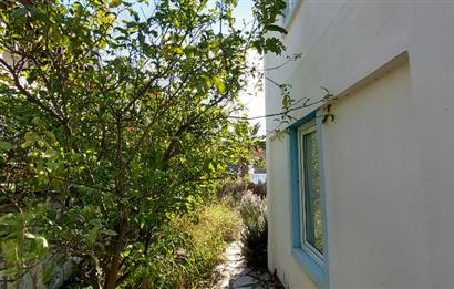 Bodrum-Adabükü özel plajlı,deniz manzaralı satılık üst dubleks daire