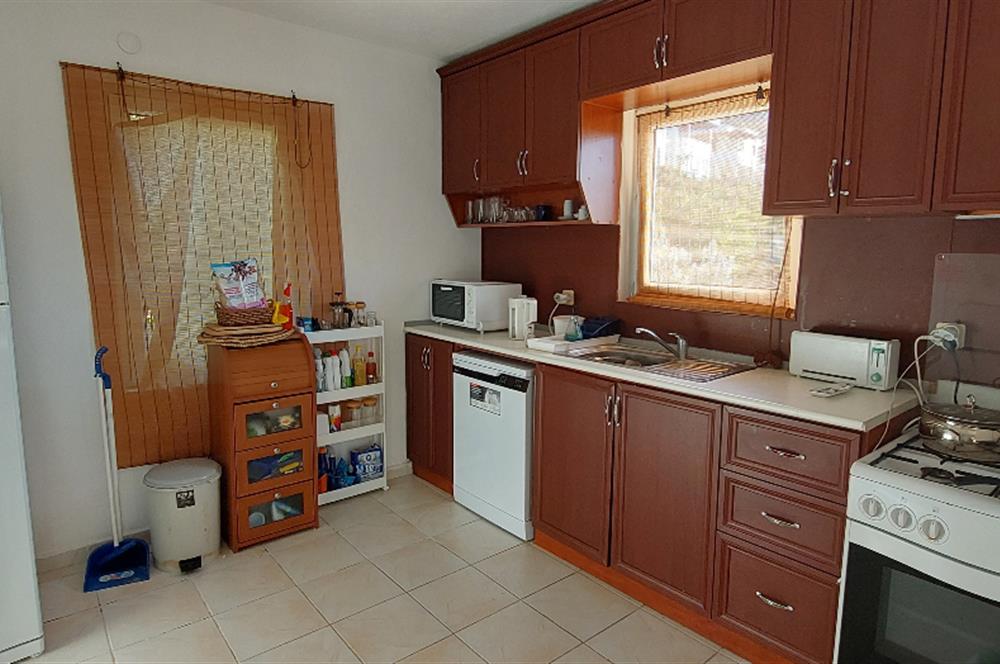 Bodrum-Adabükü özel plajlı,deniz manzaralı satılık üst dubleks daire