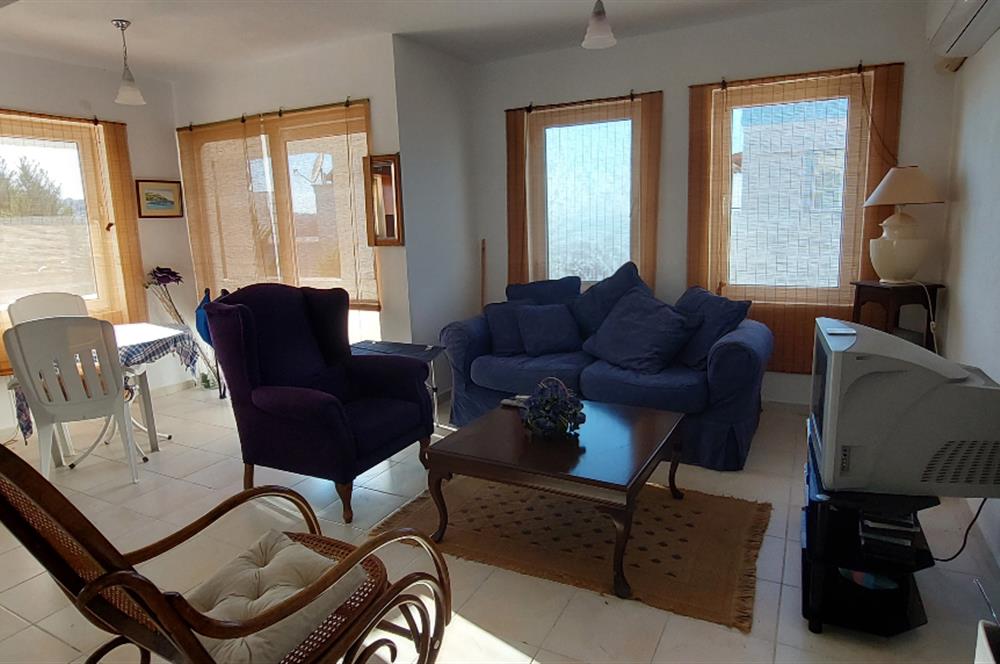 Bodrum-Adabükü özel plajlı,deniz manzaralı satılık üst dubleks daire