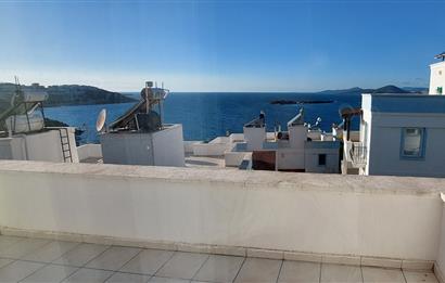 Bodrum-Adabükü özel plajlı,deniz manzaralı satılık üst dubleks daire