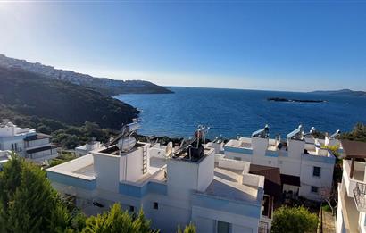 Bodrum-Adabükü özel plajlı,deniz manzaralı satılık üst dubleks daire