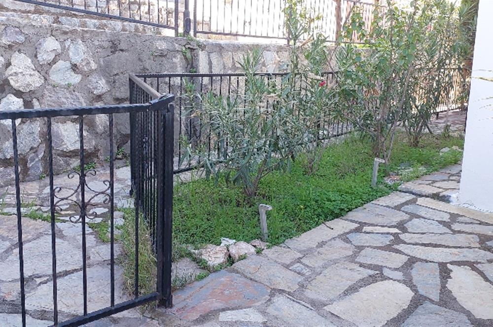 Bodrum-Adabükü özel plajlı,deniz manzaralı satılık üst dubleks daire