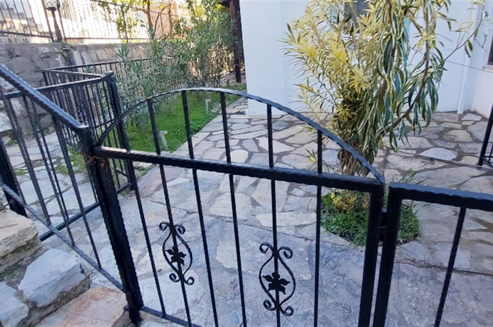 Bodrum-Adabükü özel plajlı,deniz manzaralı satılık üst dubleks daire