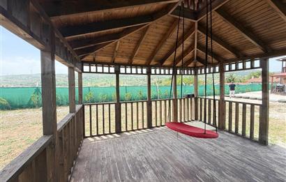 C21 BAL'DAN OVACIK MAH. 1152M2 ARAZİ İÇİNDE 2 KATLI AHŞAP EV