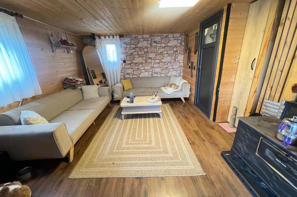 C21 BAL'DAN OVACIK MAH. 1152M2 ARAZİ İÇİNDE 2 KATLI AHŞAP EV