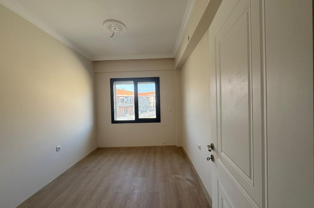 1298286656 Foça Bağarası'nda Site İçinde Sıfır Bahçe Katı Satılık 2+1 Daire 