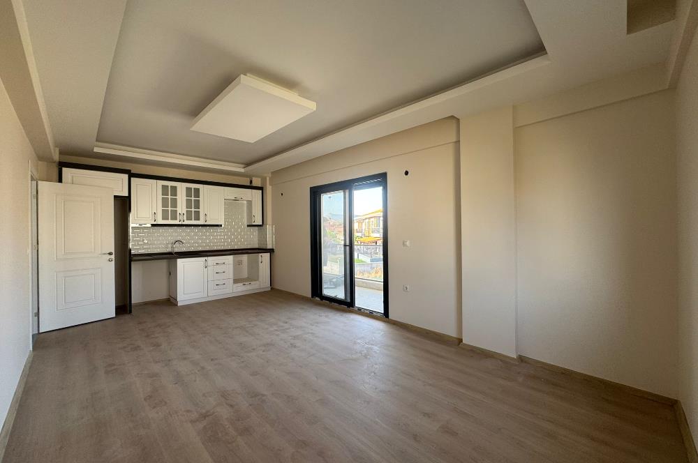 1298286656 Foça Bağarası'nda Site İçinde Sıfır Bahçe Katı Satılık 2+1 Daire 