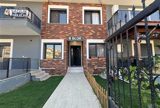 1298286656 Foça Bağarası'nda Site İçinde Sıfır Bahçe Katı Satılık 2+1 Daire  - 1 - 32085