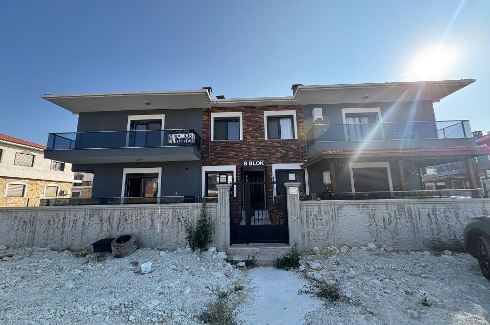 1298286656 Foça Bağarası'nda Site İçinde Sıfır Bahçe Katı Satılık 2+1 Daire 