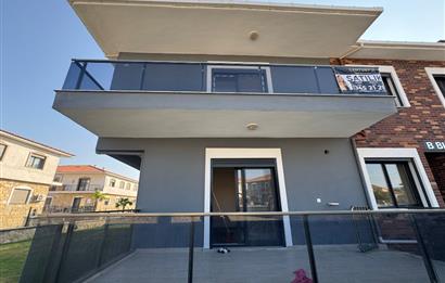 1298286656 Foça Bağarası'nda Site İçinde Sıfır Bahçe Katı Satılık 2+1 Daire 