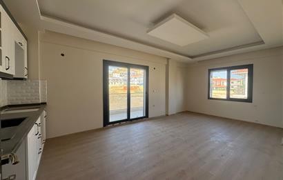 1298286656 Foça Bağarası'nda Site İçinde Sıfır Bahçe Katı Satılık 2+1 Daire 