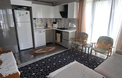 İncek'de memur kiracılı 1+1 dairemiz satlıktır