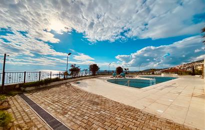 DİDİM AKBÜK’TE DENİZ MANZARALI, HAVUZLU SİTEDE SATILIK EŞYALI 2+1 DUBLEKS DAİRE