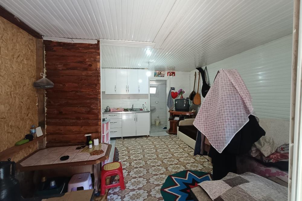 🌿 ORDU AYBASTI’DA DEREYE SIFIR, AHŞAP EVLİ 500 m² SATILIK ARSA 🌿