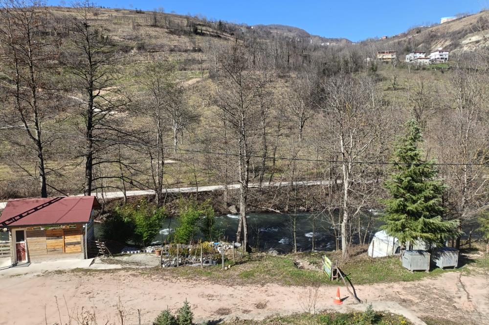 🌿 ORDU AYBASTI’DA DEREYE SIFIR, AHŞAP EVLİ 500 m² SATILIK ARSA 🌿