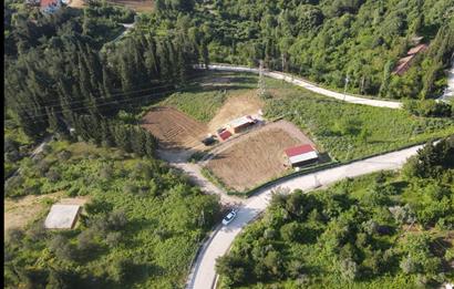 DENİZ İLE DOĞANIN BULUŞTUĞU YER ULAŞLIDA ARSA VE ÜZERİNDE YAPI