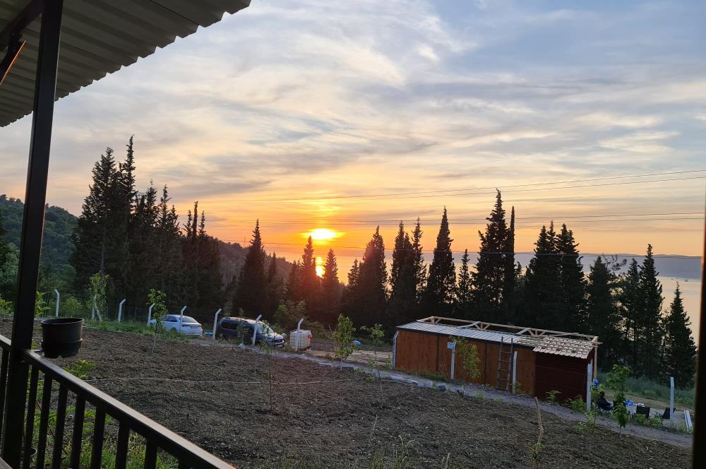 DENİZ İLE DOĞANIN BULUŞTUĞU YER ULAŞLIDA ARSA VE ÜZERİNDE YAPI