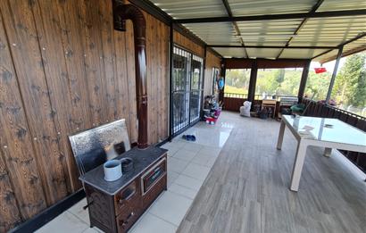 DENİZ İLE DOĞANIN BULUŞTUĞU YER ULAŞLIDA ARSA VE ÜZERİNDE YAPI