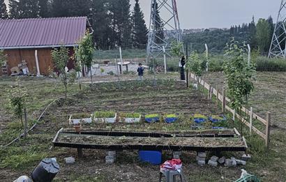 DENİZ İLE DOĞANIN BULUŞTUĞU YER ULAŞLIDA ARSA VE ÜZERİNDE YAPI