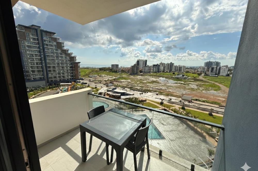 İskele Long Beach Riverside Life'da Tam Eşyalı 2+1 Satılık Daire