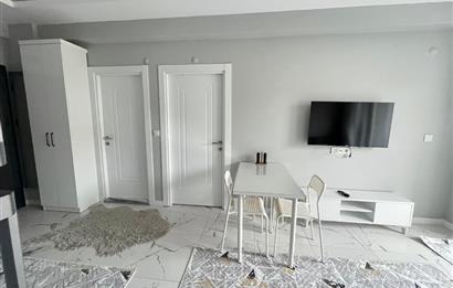 MERKEZİ KONUM GOP'TA SIFIR ARA KAT EŞYALI KİRALIK 1+1 DAİRE