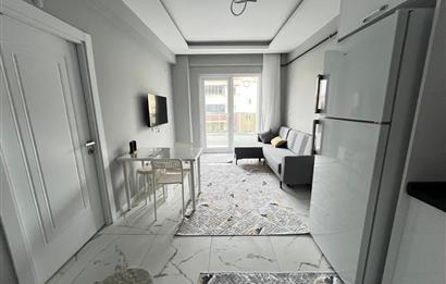 MERKEZİ KONUM GOP'TA SIFIR ARA KAT EŞYALI KİRALIK 1+1 DAİRE