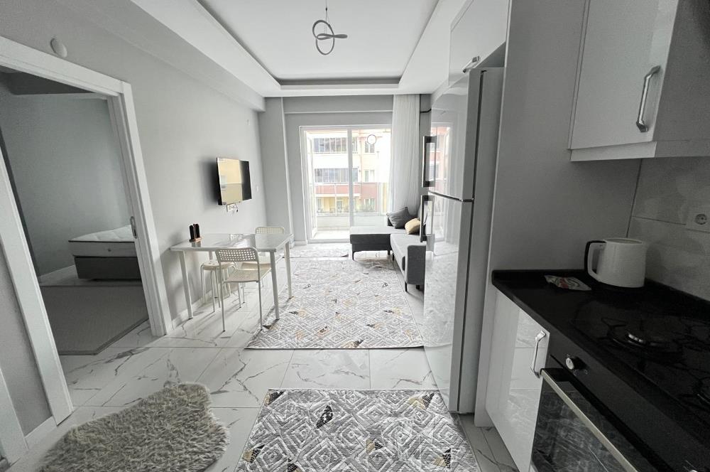 MERKEZİ KONUM GOP'TA SIFIR ARA KAT EŞYALI KİRALIK 1+1 DAİRE