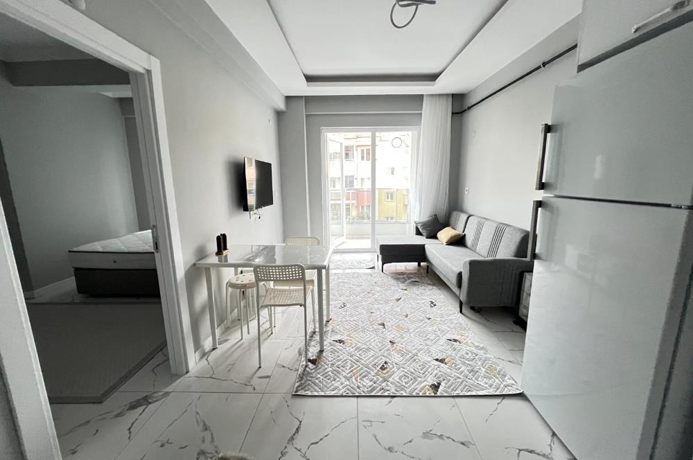 MERKEZİ KONUM GOP'TA SIFIR ARA KAT EŞYALI KİRALIK 1+1 DAİRE