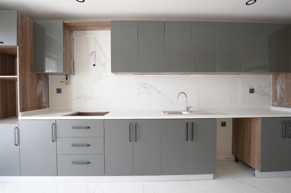 C21 Cius; Hisar’da Özel Bahçeli, Deniz Manzaralı Sıfır 3+1 Daire