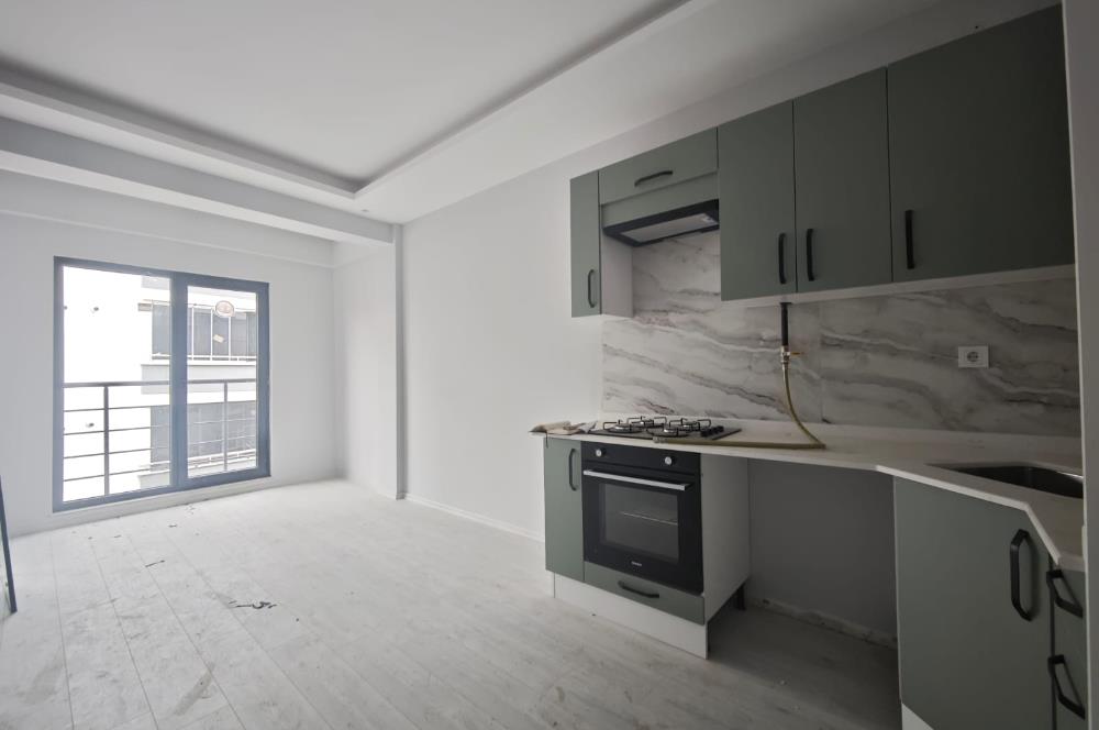 CENTURY 21 BAL'DAN  1.ORUÇGAZI MAHALLESİNDE KAPALI GARAJLI   SATILIK 2+1 DAİRE