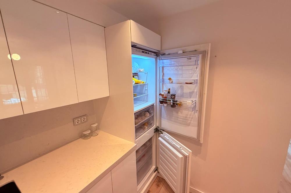 CADDEBOSTAN SAHİLDE 1+1 KİRALIK DAİRE