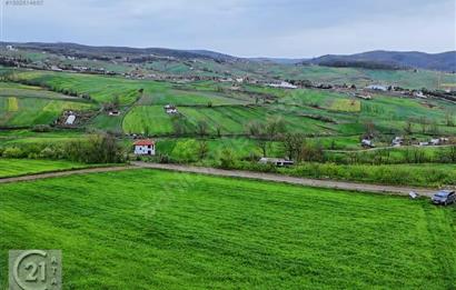 SEVİNDİKLİDE İMARLI GÖL MANZARALI YOLA CEPHELİ ARAZİ