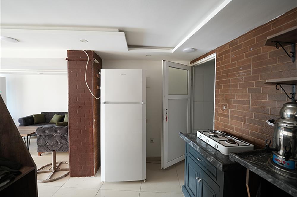 C21 Cius; Sahile Cephe Satılık Dükkan