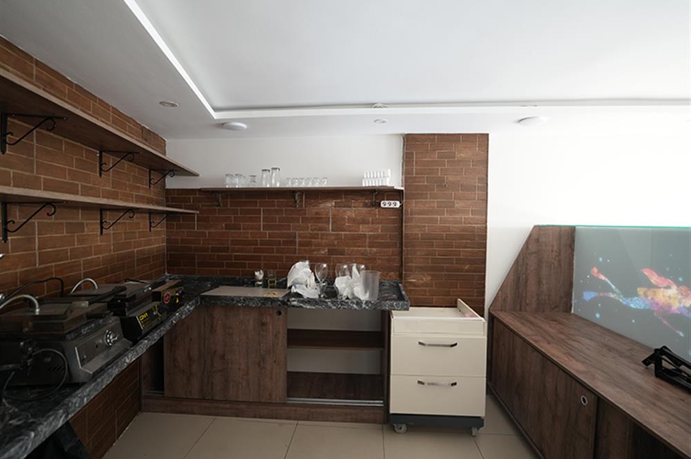 C21 Cius; Sahile Cephe Satılık Dükkan