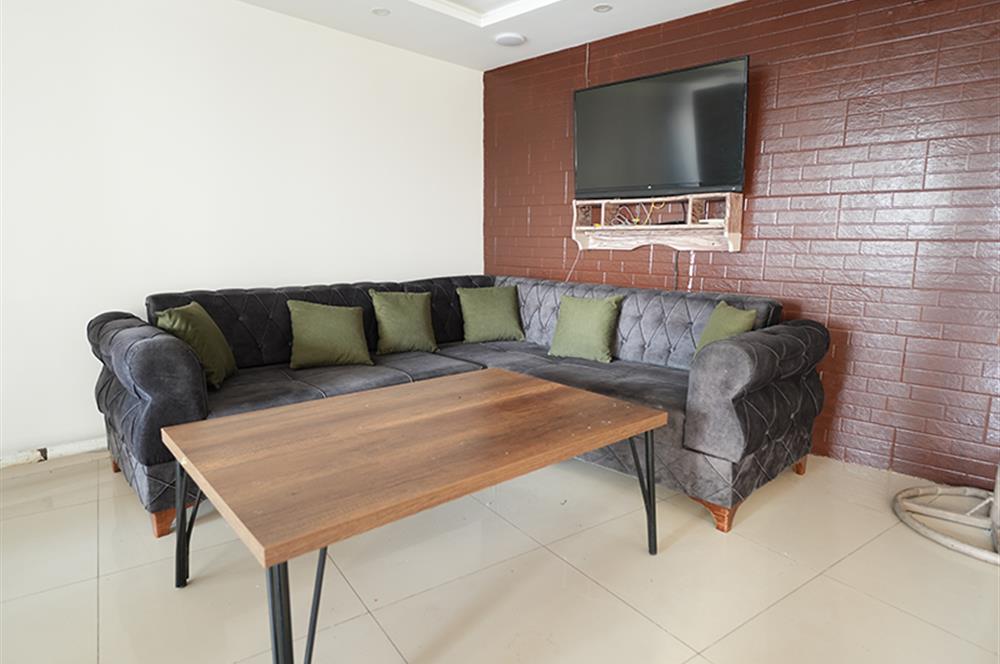 C21 Cius; Sahile Cephe Satılık Dükkan