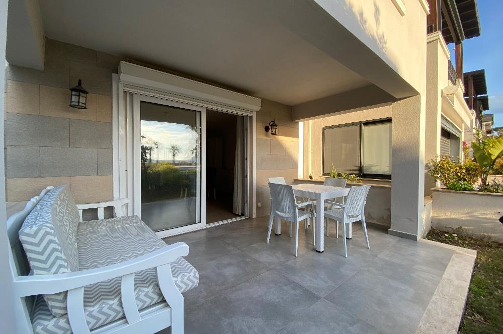 Denize Sıfır Havuzlu Site İçinde Kum Plaj Kullanımlı Kiralık Deniz Manzaralı Bahçe Katı Eşyalı Daire