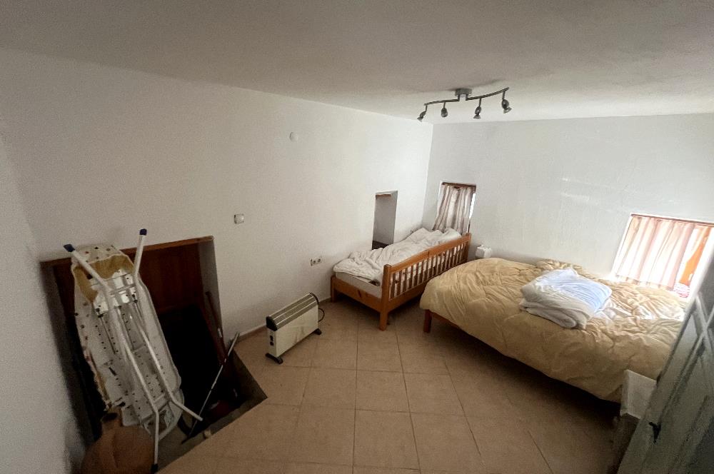 Gümüşlük Peksimet'te 2 Tapulu, 150m² Bahçeli Taş Ev