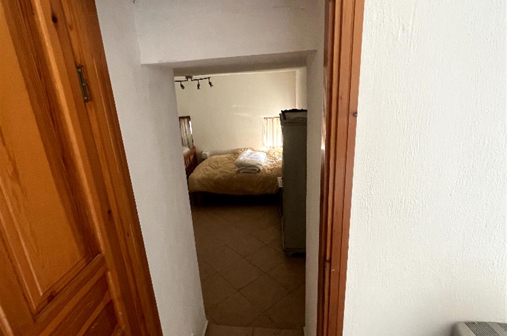 Gümüşlük Peksimet'te 2 Tapulu, 150m² Bahçeli Taş Ev